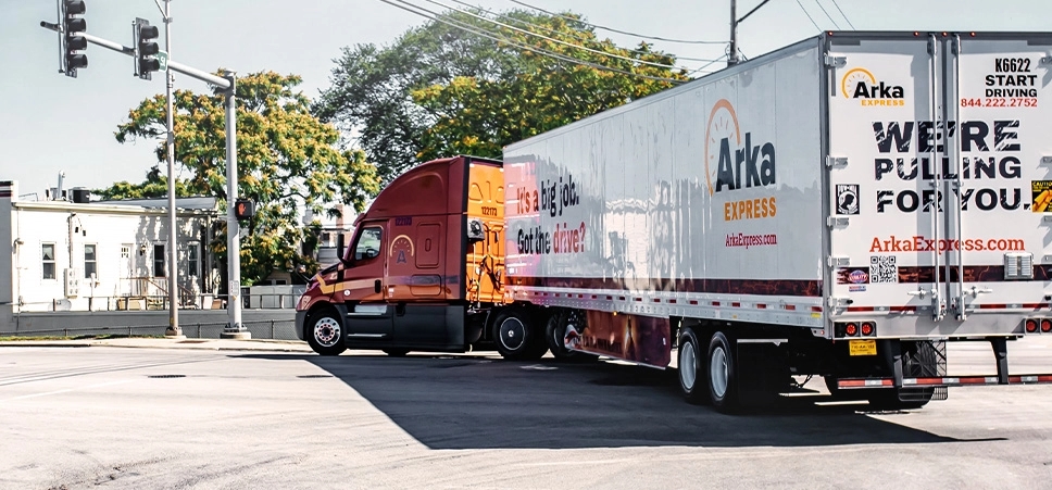 Arka semi truck turning onto a street